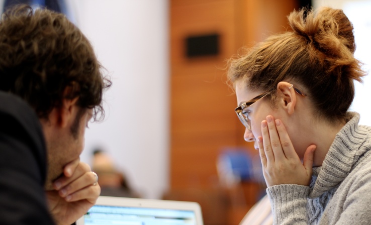 Student at career fair talking to job recruiters