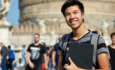 Student smiling on campus