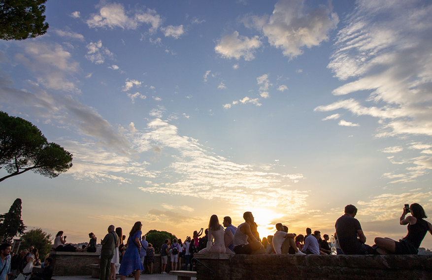 JCU students outside enjoying evening sunset