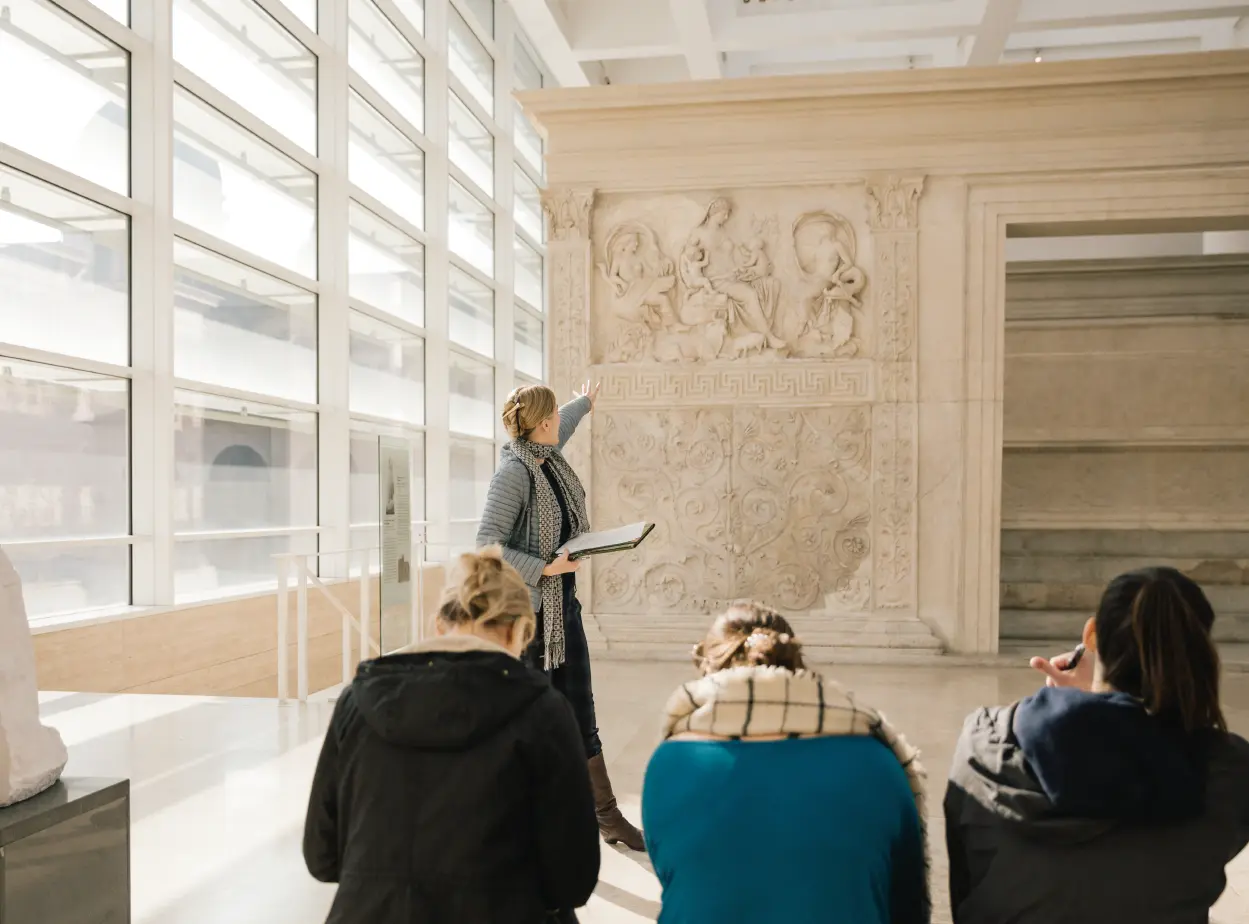 Professor teaching classroom at Ara Pacis