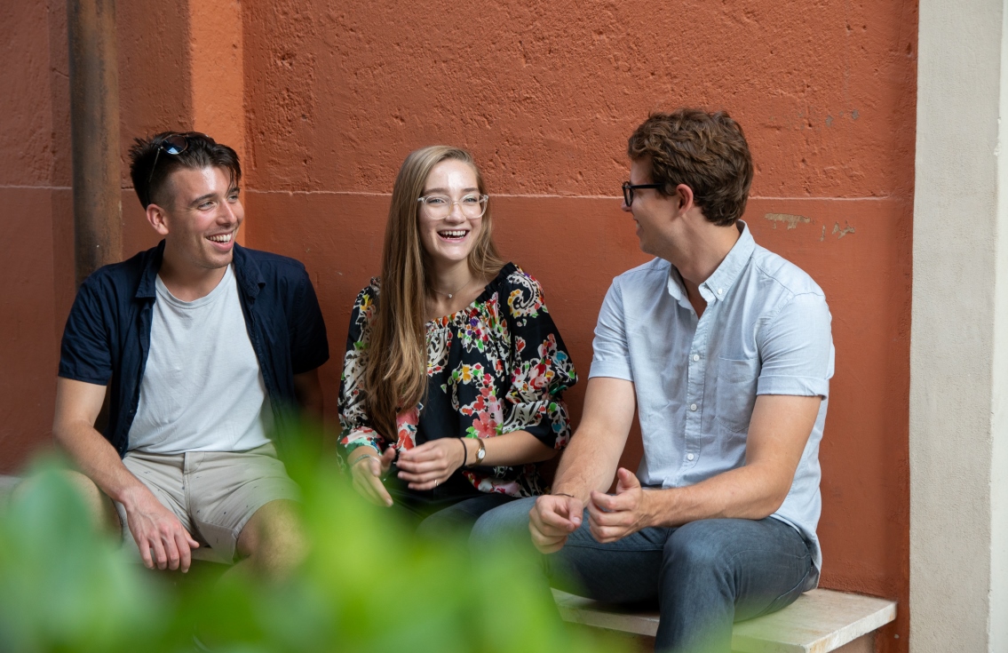 Student talking in courtyard