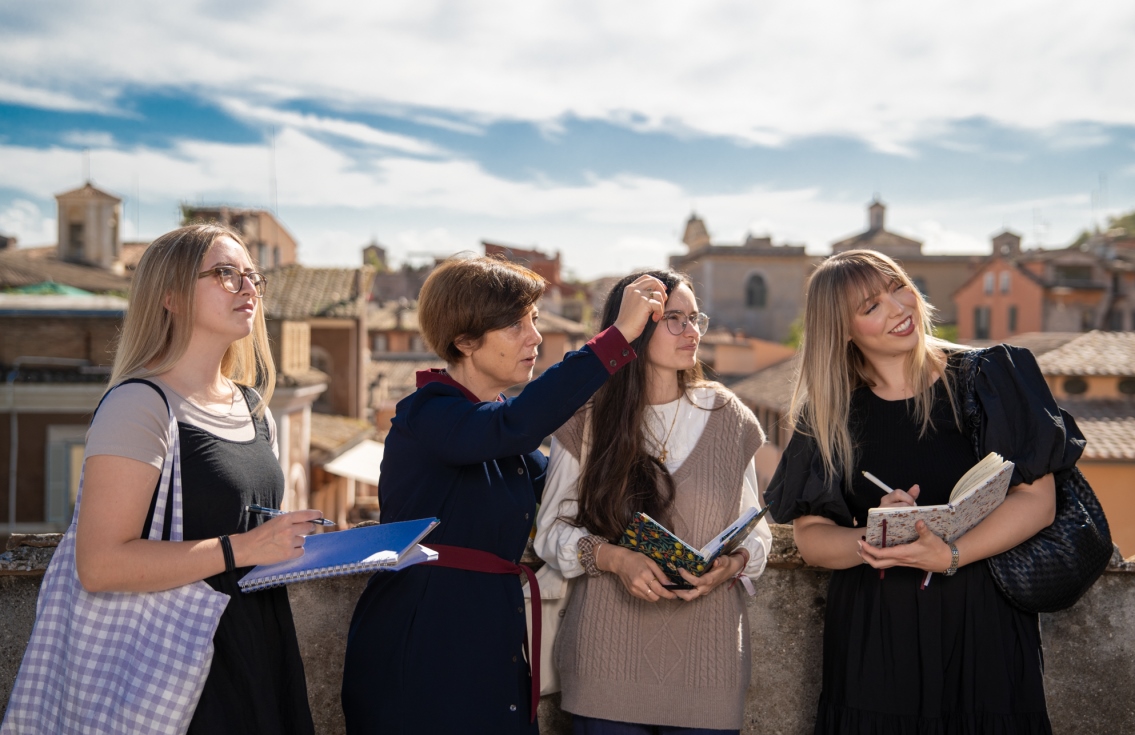 Professor with students at Guarini