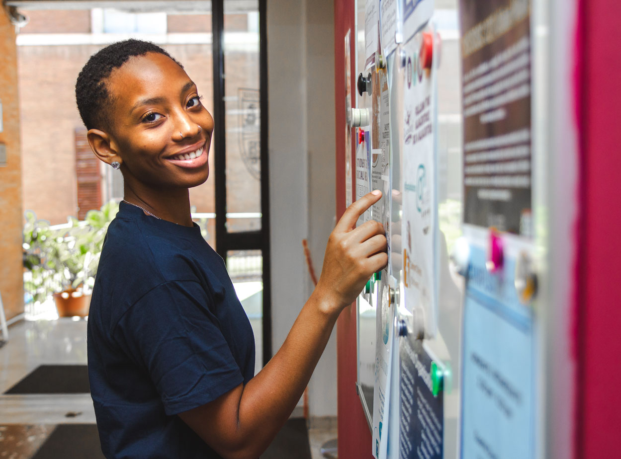 Student at bulletin board