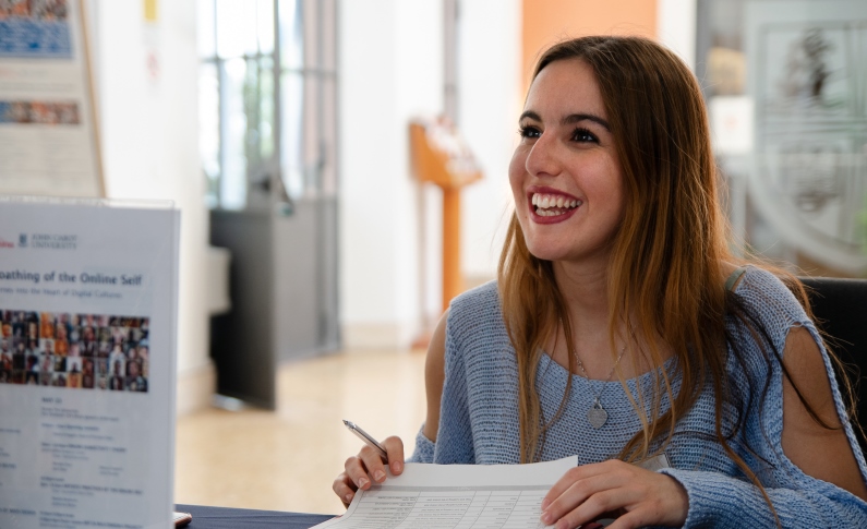 Student at welcome desk
