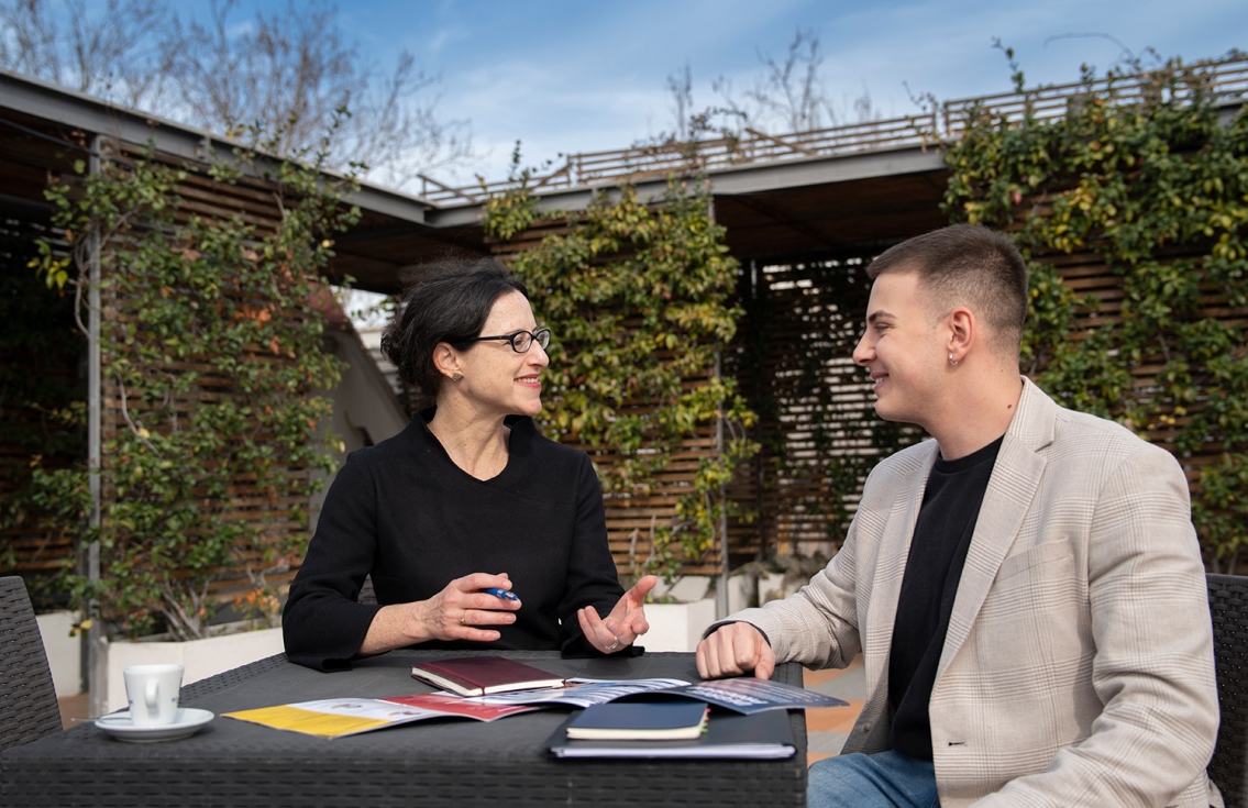 Professor and a student on the terrace