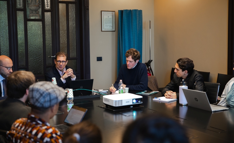 Expert holding a lecture to graduate students