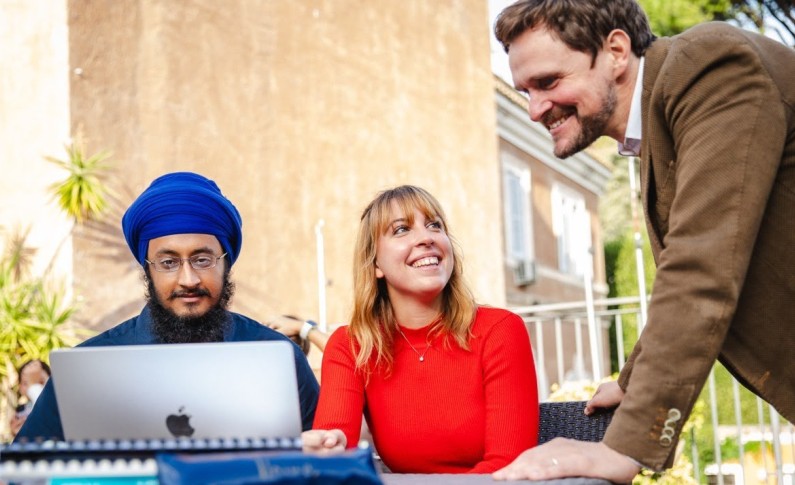 Professor helping students