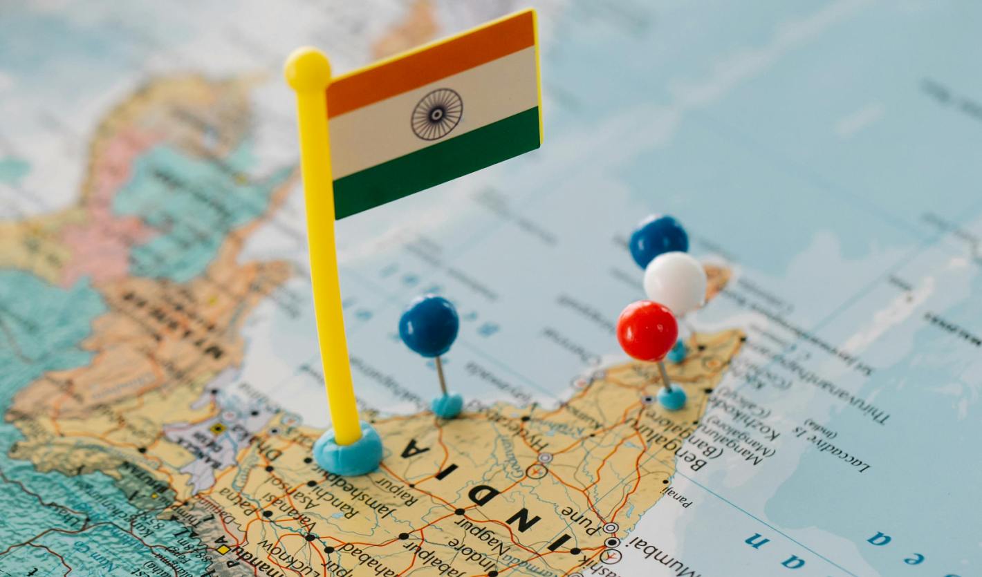 Indian flag over a map of the country