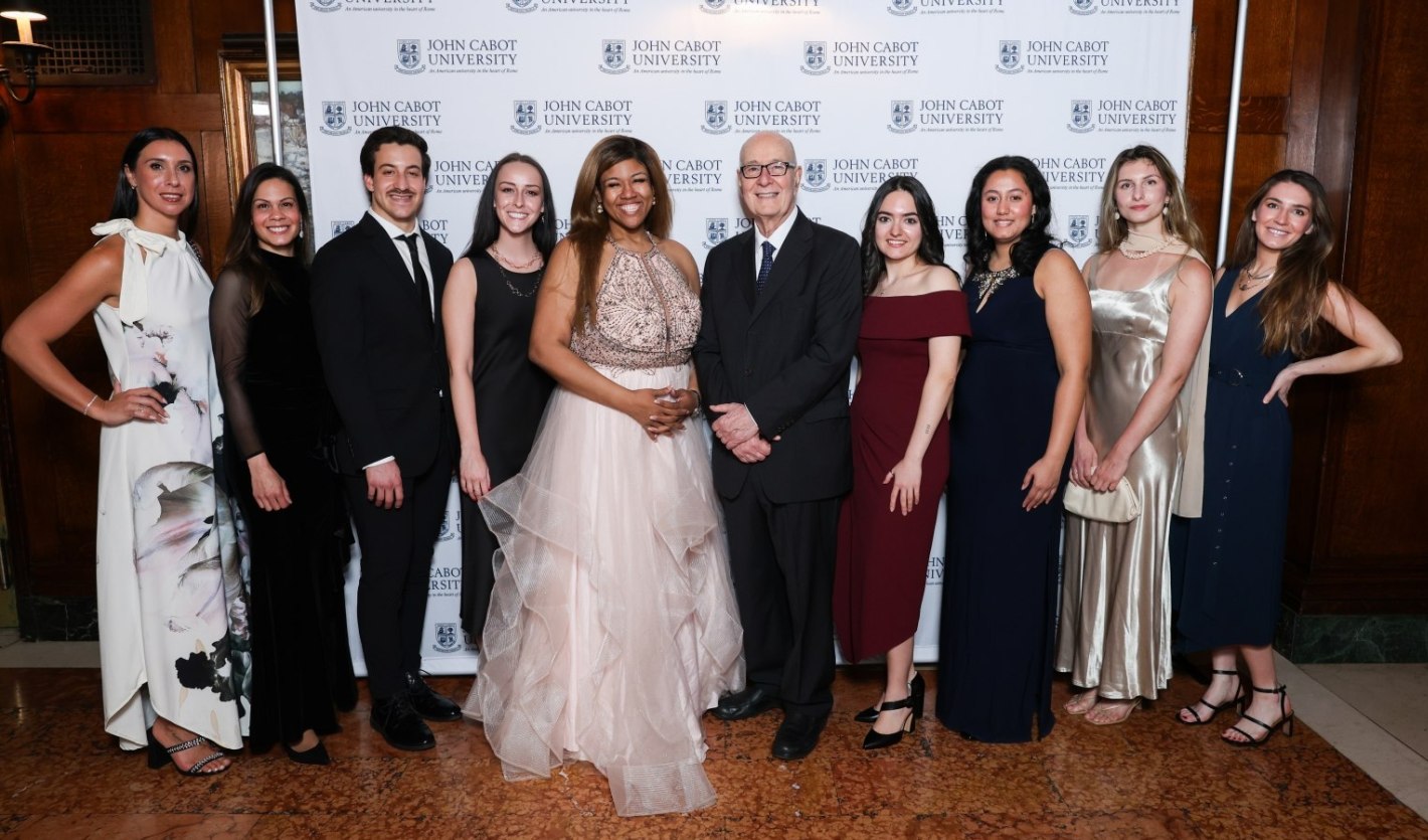 Center: President Franco Pavoncello with Alumna and JCU Trustee Alexandria Maloney, joined by fellow alumni