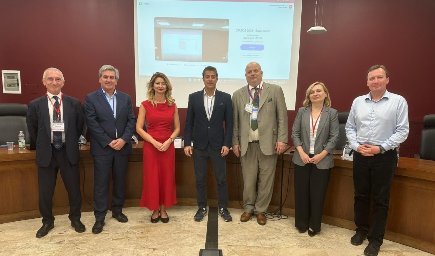 Professor Scicchitano, center, with colleagues at the IASOS conference