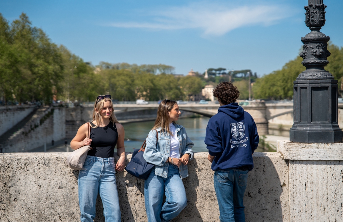 Students on a bridge in Rome