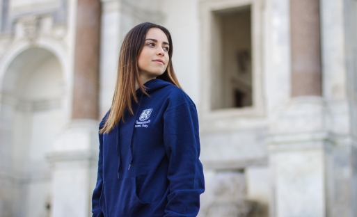 Student in front of Rome building