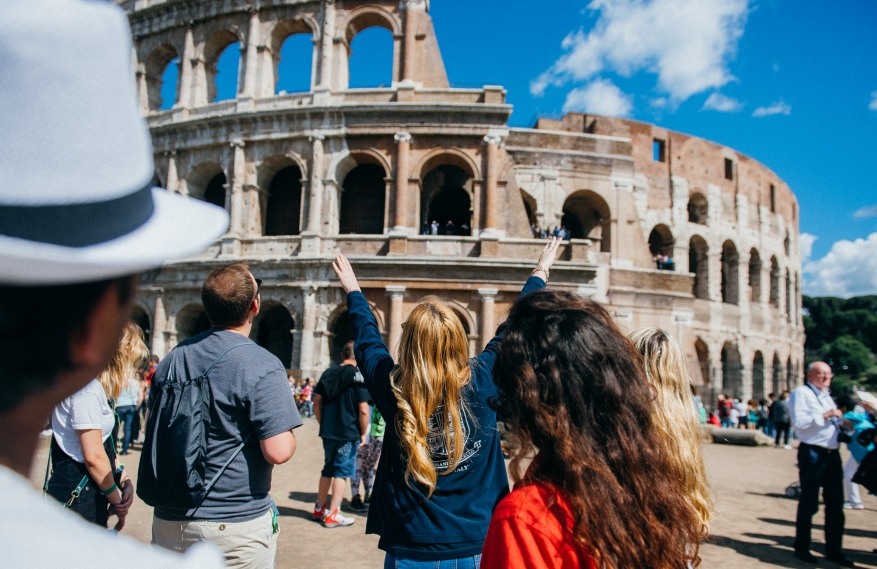 Student in front of Rome Coliseum 