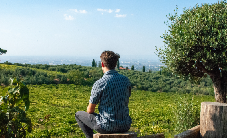Student looking out at the hills