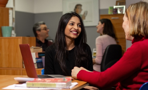 Student talking to professor